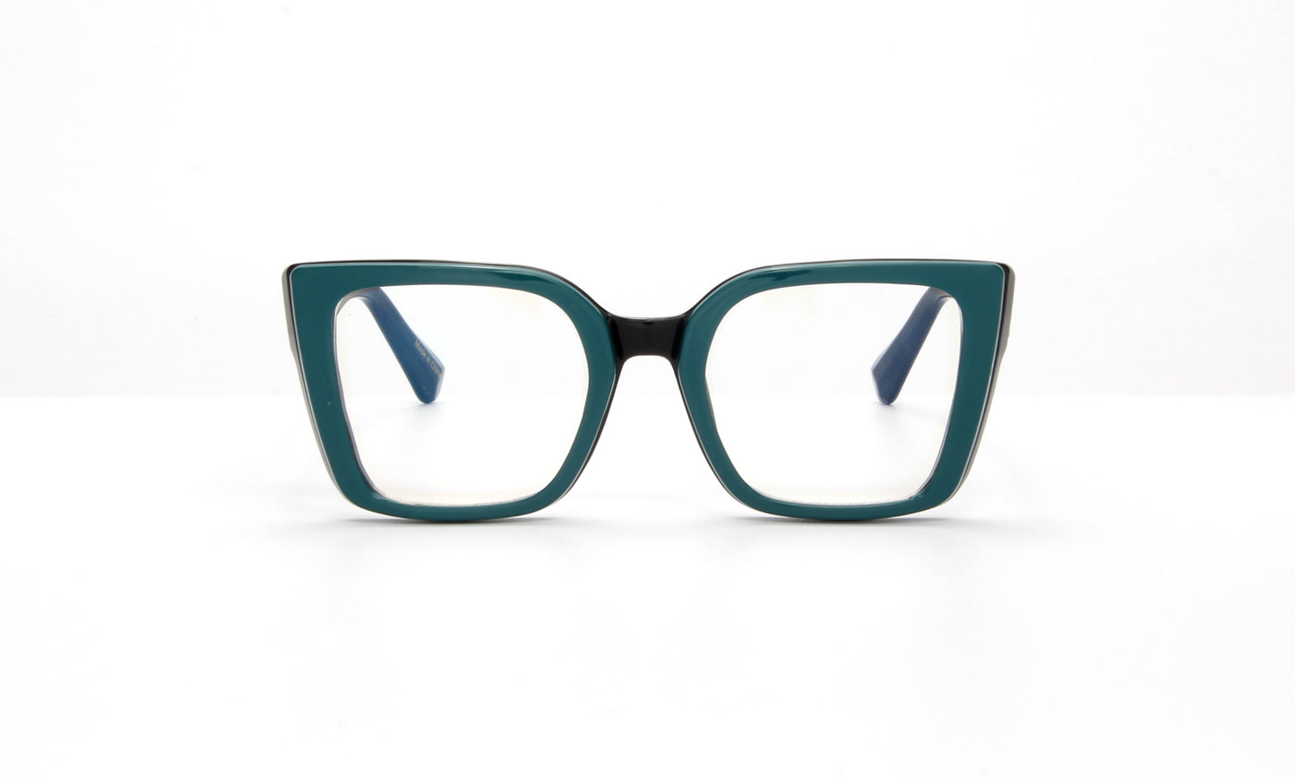 Green and black eyeglasses on a white background
