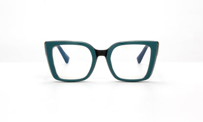 Green and black eyeglasses on a white background