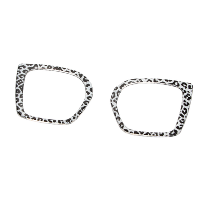 Two leopard print eyeglass frames on a white background