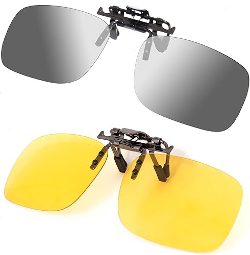 Two pairs of sunglasses with clip-on lenses, one gray and one yellow, on a white background.
