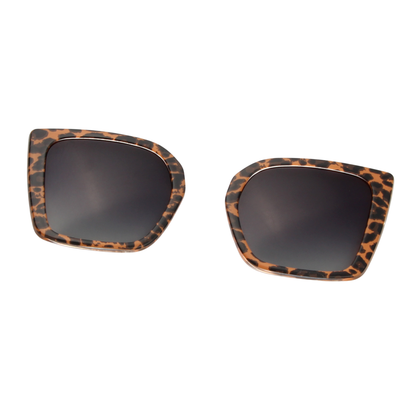 Pair of sunglasses with leopard print frames on a white background