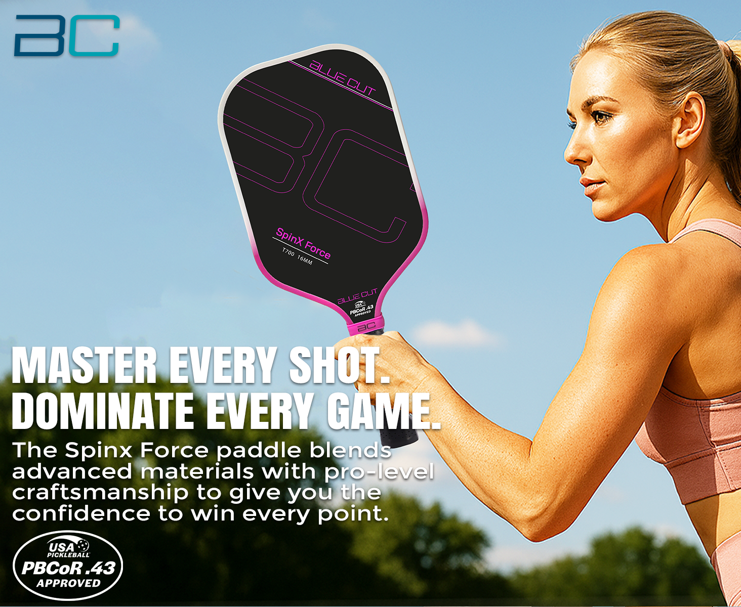 Woman holding a Spinx Force pickleball paddle